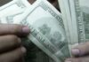 Dólar cai a R$ 4,98 e acumula perda de 4,44% na semana