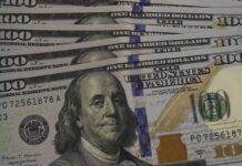 Dólar cai a R$ 5,13, e bolsa recua em dia de ajuste no mercado