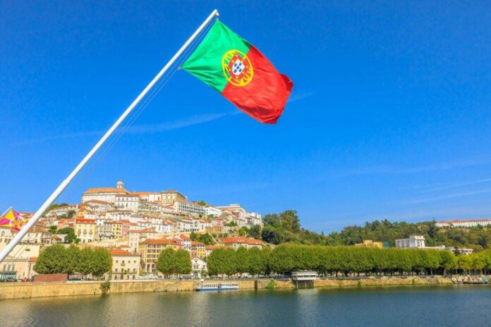 multi-colored-flag-building-against-blue-sky-2048x1365-1-1024x683.jpg